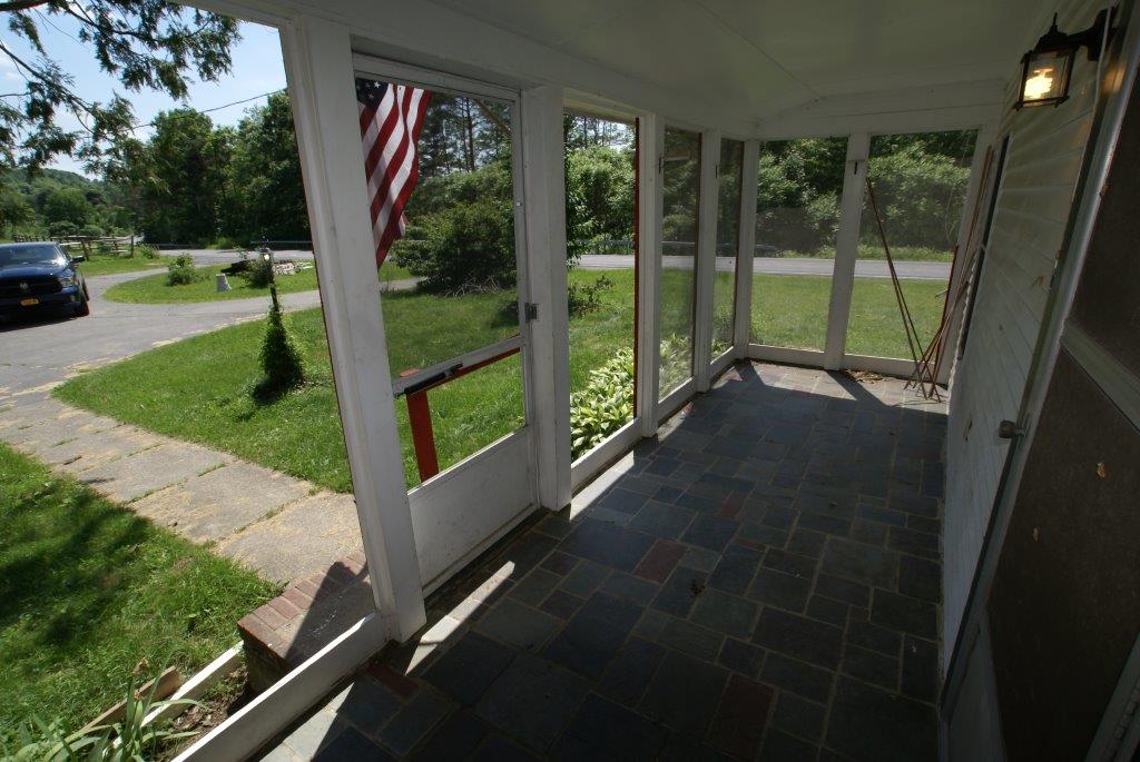 Country Gentlemen's Screened In Porch From DC Realty