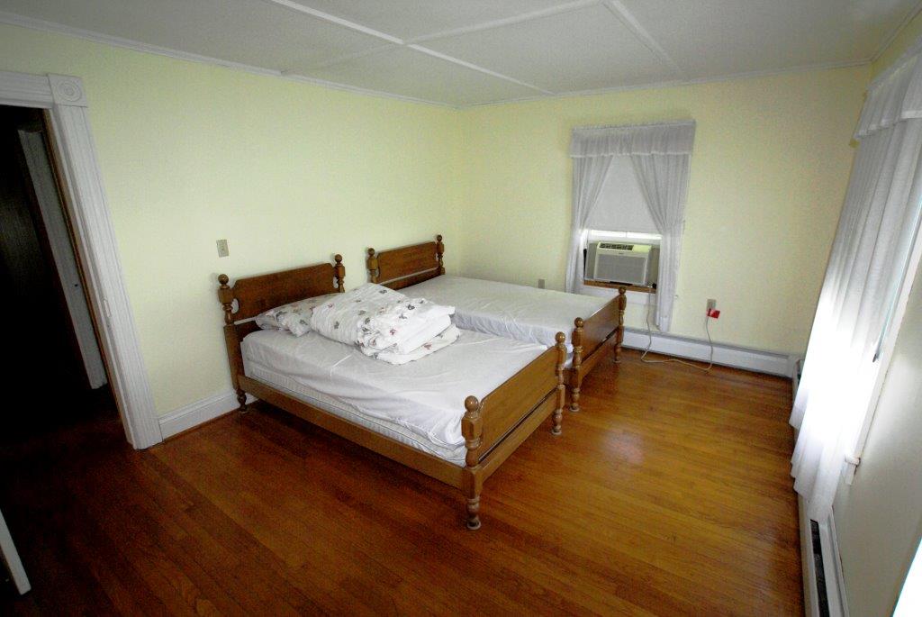 A Bedroom in the Spacious Village Home from DC Realty